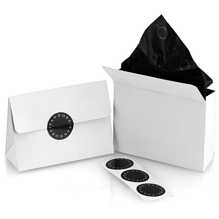 Elegant packaging for PANDORA JEWELRY Mod. 163885C00-56, showcasing branded bags and logo stickers, enhancing gift presentation.