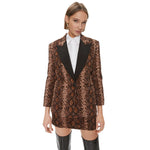 Model wearing PINKO Brown Cotton Women Blazer with python print, peak lapels, single-button closure, and front pockets.