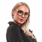 Blonde lady wearing PUCCI MOD. EP5093 54005 glasses looking stylish in a black jacket, enhancing feminine fashion allure.