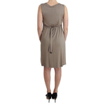 Rear view of a Roccobarocco Khaki studded sheath dress featuring a tie waist, sleeveless design, and knee-length cut.