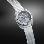 SEIKO 5 Mod. SPORTS Automatic silver watch with metal bracelet against a gray background