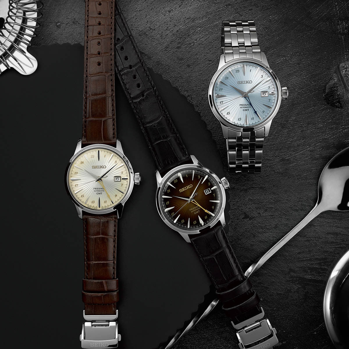 SEIKO PRESAGE Mod. COCKTAIL AUTOMATIC - LEATHER, CREAM watch displayed with other models on a dark background