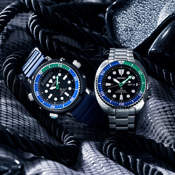 SEIKO PROSPEX Mod. TURTLE TROPICAL LAGOON Automatic Diver's 200 watches on textured surface.