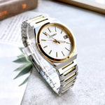 SEIKO WATCHES Mod. SUR558P1 gent wristwatch with 38.5 mm gold case, sapphire dial, and SS bracelet, in official packaging.