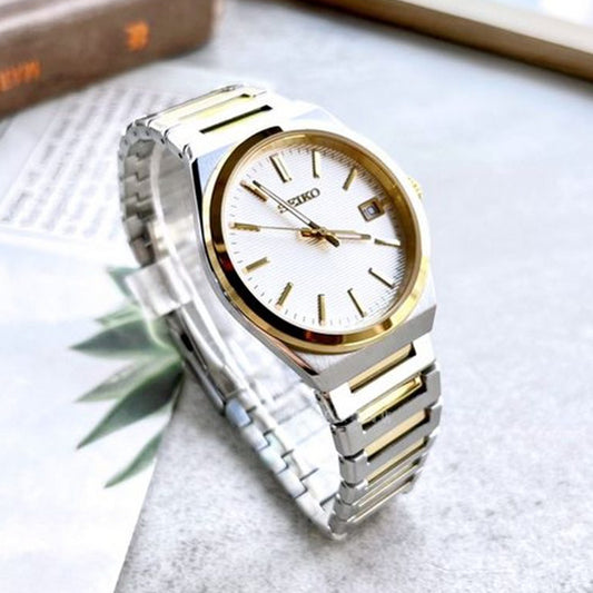 SEIKO WATCHES Mod. SUR558P1 gent wristwatch with 38.5 mm gold case, sapphire dial, and SS bracelet, in official packaging.