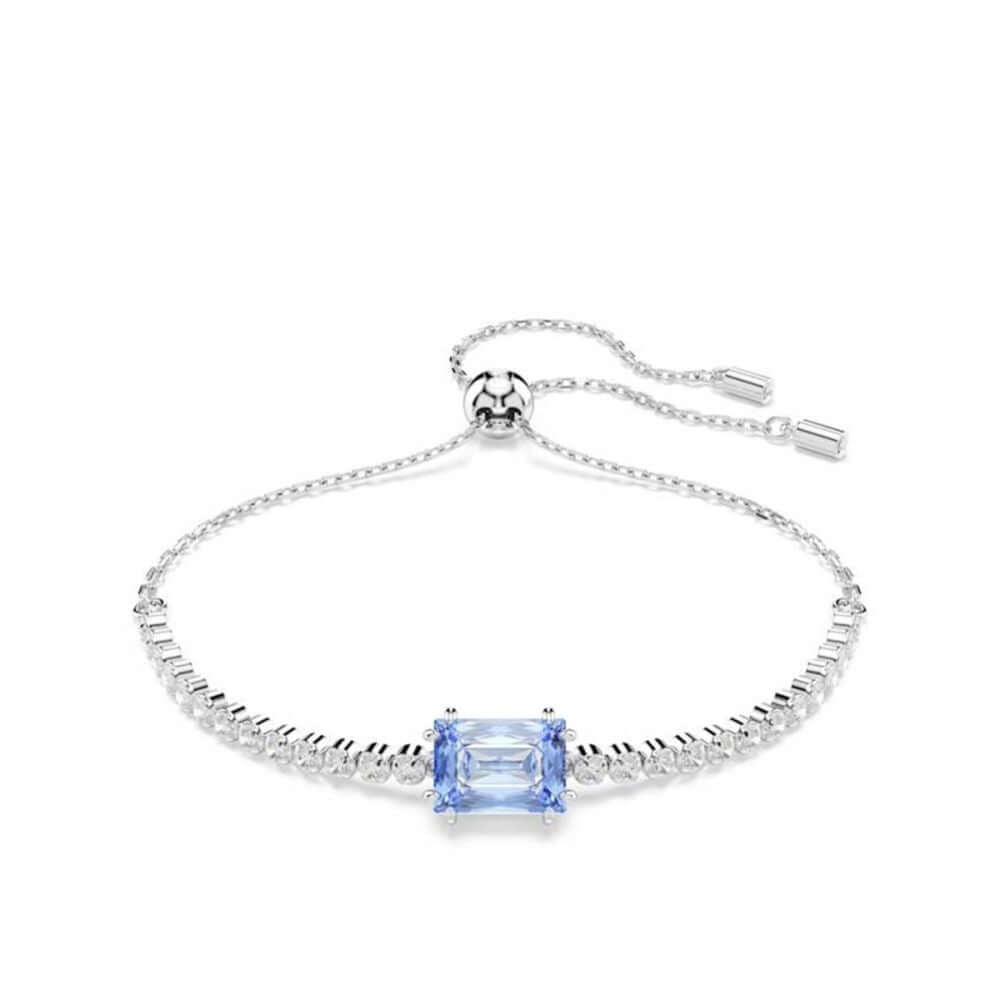 Elegant bracelet with blue gemstone centerpiece and adjustable chain, representing luxury jewelry design.