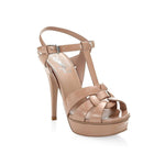 Saint Laurent Tribute High Heel Sandals in nude leather with round toe, and adjustable buckle closure, featuring silver-tone hardware.