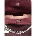 Stella McCartney Falabella Tiny crossboydy bag in bordeaux red with chain-link handles, magnetic fastening, and logo charm, inside view.