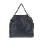 Stella McCartney Falabella mini handbag with chain-link handles, blue black finish, and magnetic fastening.