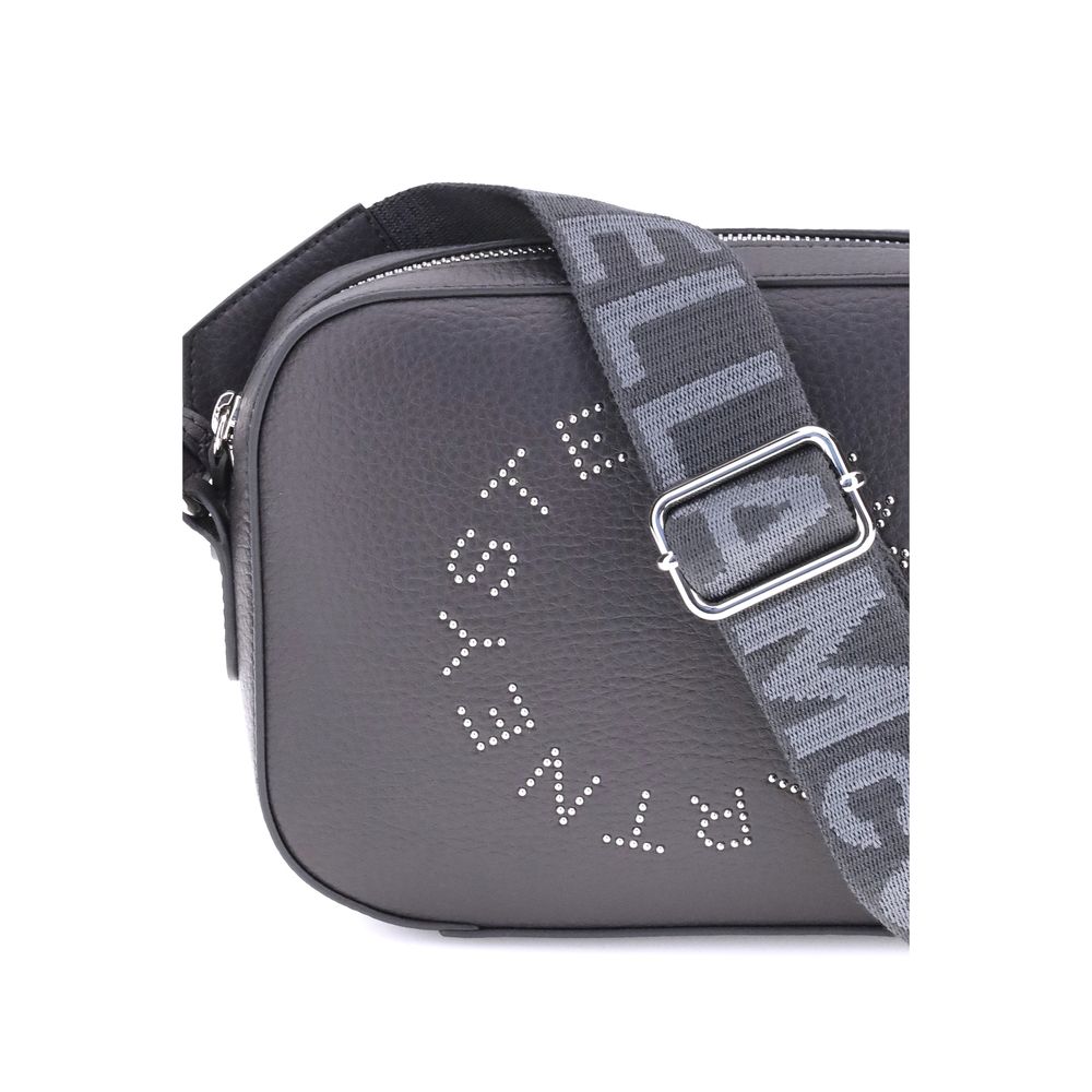 Close-up of Stella McCartney Faux leather Shoulder Bag featuring engraved monogram and adjustable strap for comfort and style, AW25 collection.