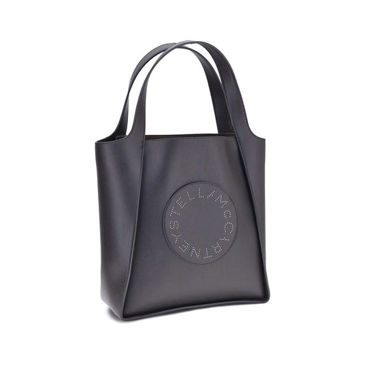 Stella McCartney Logo Tote Bag with studs on the front patch, featuring flat handles and a spacious interior for sustainable style.