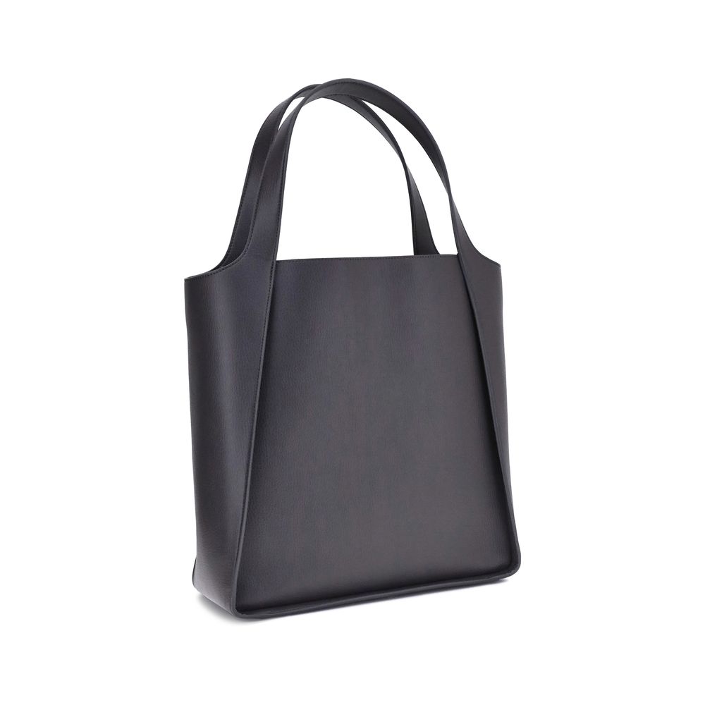 Front view with bag zipped and handles upright.