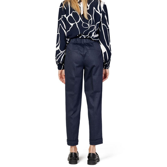 Back view of woman wearing Street One Blue Viscose Pant, showcasing tapered fit and double button fastening.