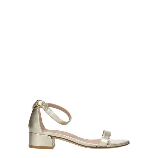 Stuart Weitzman Gold Leather Sandals with a buckle closure and 3.5 cm mid heels, featuring an open toe and metallic platinum accents.