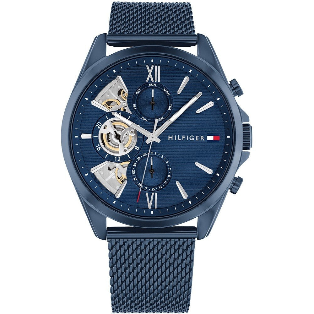 TOMMY HILFIGER MOD. BAKER stylish men's watch with blue dial and mesh strap, showing elegant design and multifunction features.