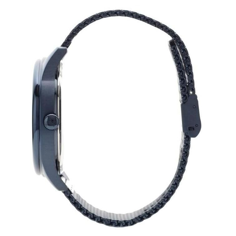 Side view of wristwatch showcasing details of band design and watch face thickness.