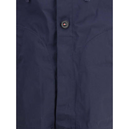 Thom Browne Blue Polyester Shell Jacket with waterproof fabric and striped grosgrain detail.