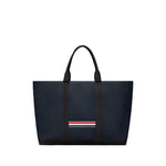 Thom Browne Medium drawstring opening tool tote bag, navy blue leather with RWB stripe and protective dust bag included.