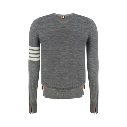 Back view of Thom Browne Sweater showing iconic contrast stripes on left arm, ribbed knit and monochrome pattern, AW25 collection.