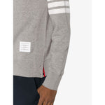 Side view of Thom Browne Sweaters Light Grey with 4-Bar stripe and name tag on the left arm.
