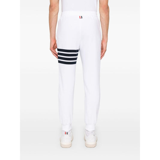 Back view of Thom Browne Trousers White elasticated waistband, grosgrain loop tab, 4Bar cotton design.