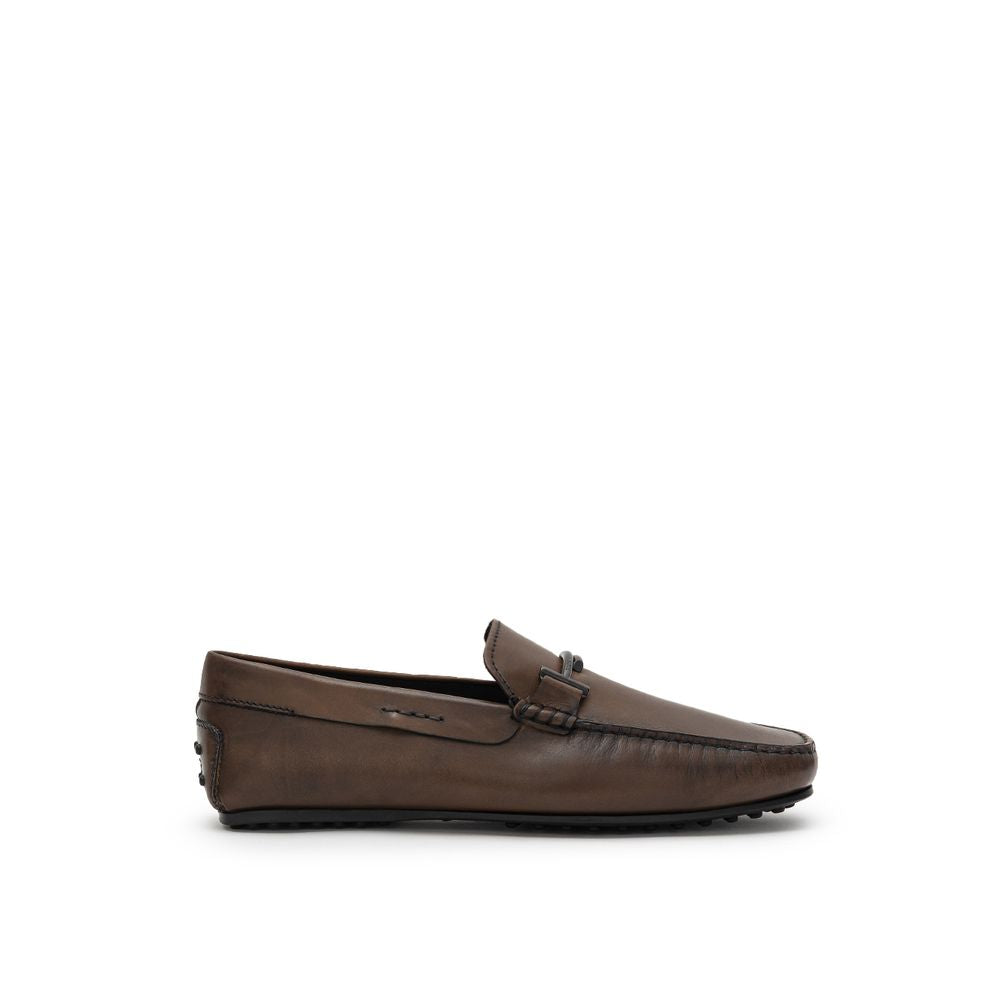 Tod's Brown Leather Moccassin for men with Gommino sole and metal decoration, ideal for formal and casual wear, made in Italy.