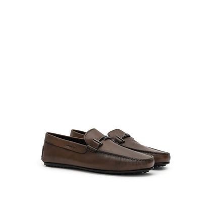 Tod's Brown Leather Moccassin with Gommino sole and metal decoration for men.