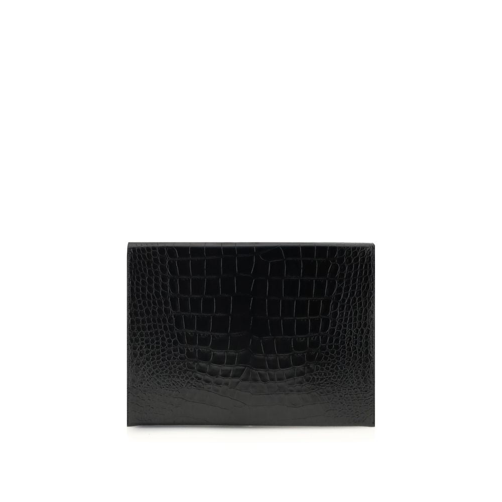 Tom Ford Black Leather Clutch Bag with crocodile print, featuring a sleek rectangular design and interior pocket, perfect for stylish functionality.