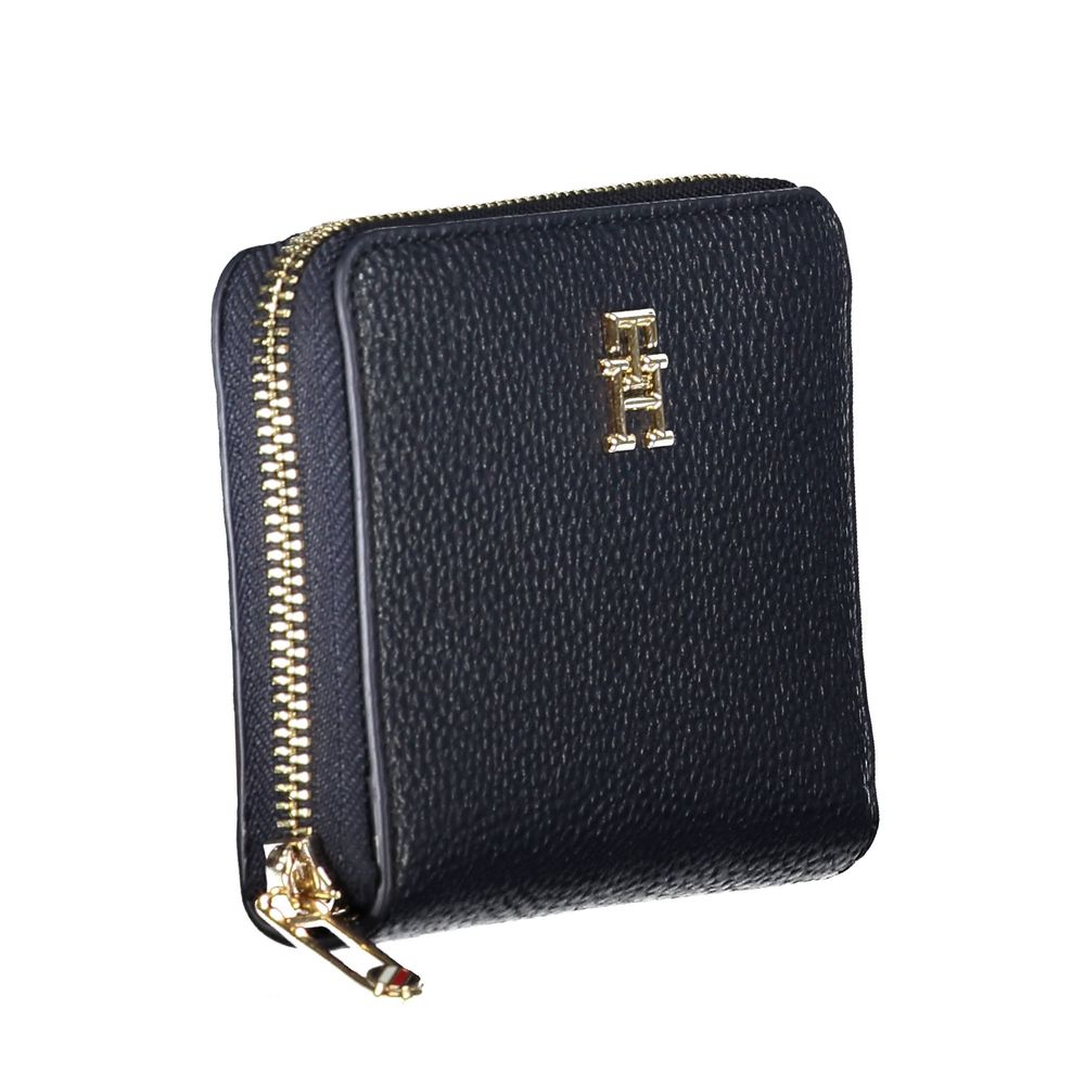 Tommy Hilfiger Blue Polyethylene Women Wallet with gold zipper and logo detailing, showcases fashion-forward style and functionality.