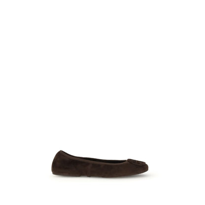 Tory Burch Brown Calf Leather Bos Taurus Ballet Flats with metal logo applique and elasticized edges for comfort and style.
