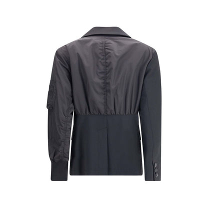 Back view of Undercover Black Polyester Bomber with unique blazer design, zippered sleeve pocket, and ribbed cuffs.