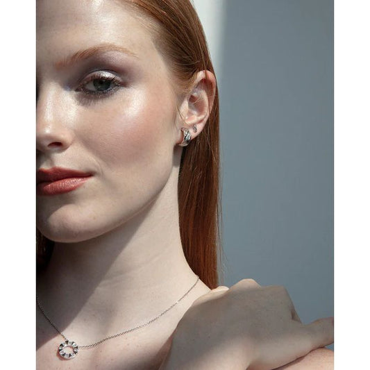 Woman wearing VICEROY JEWELS Mod. 2329E000-30 silver earrings, showcasing elegant design suitable for ladies, close-up view.