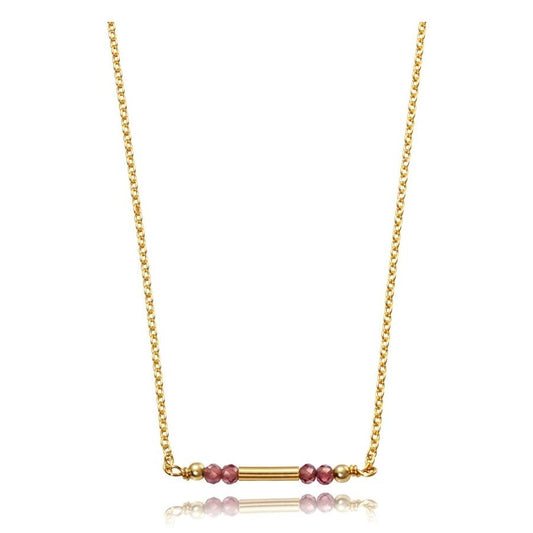 Gold chain necklace with pink bead accents on a white background