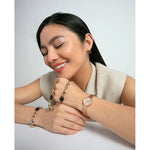 Woman wearing VICEROY Mod. 41148-77 watch and bracelet, showcasing elegant jewelry with a smiling expression.