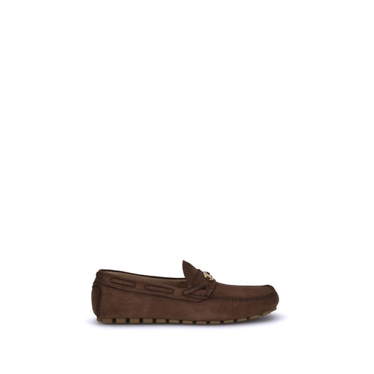 Valentino Garavani Brown Rubber Slip-On Loafers with VLogo and notched rubber sole for comfort and elegance