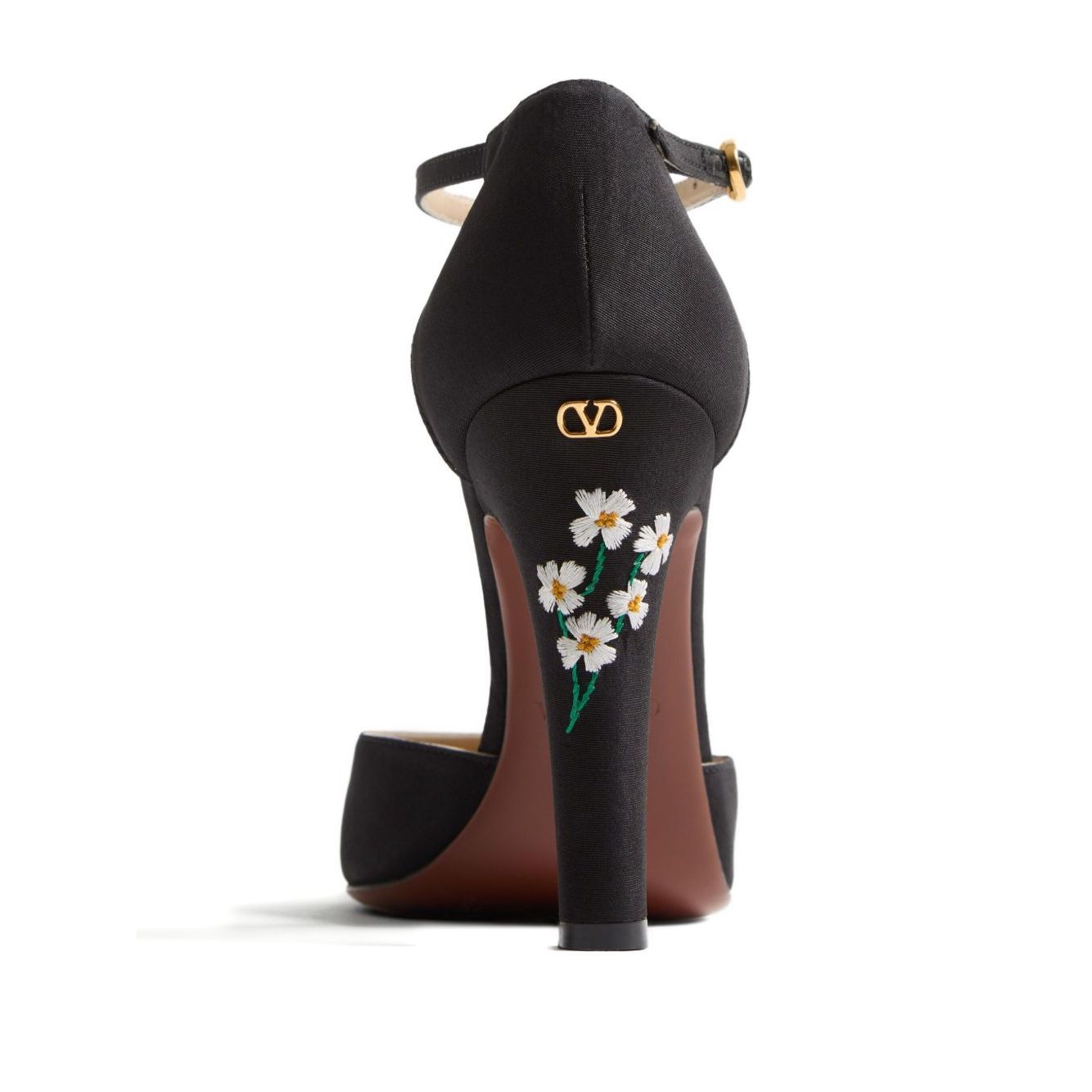 Back view of Valentino Garavani Hi Dolly Pumps In Fabric With Floral Embroidery 105mm, showcasing daisy embroidery and black ankle strap.