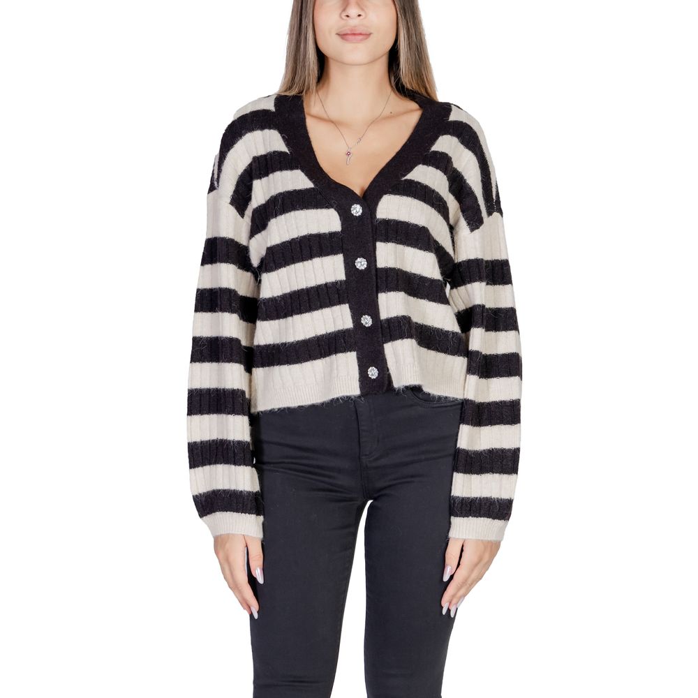 Model wearing Vero Moda Beige Polyester Cardigan, fall/winter women's knitwear, striped black and beige design, polyester blend