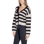 Fashion model wearing Vero Moda Beige Polyester Cardigan with black and white stripes, part of the women's knitwear fall/winter collection.