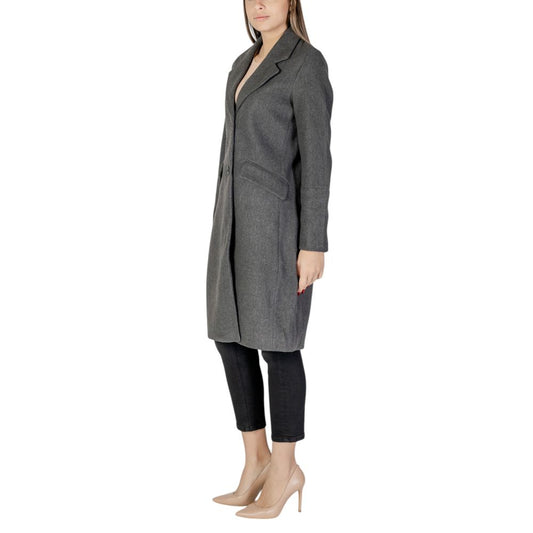 Woman wearing Vero Moda Gray Polyester Coat with classic lapel collar and straight silhouette.
