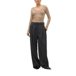 Woman wearing Vero Moda Gray Polyester Pant with wide-leg and pinstripe for a modern look.