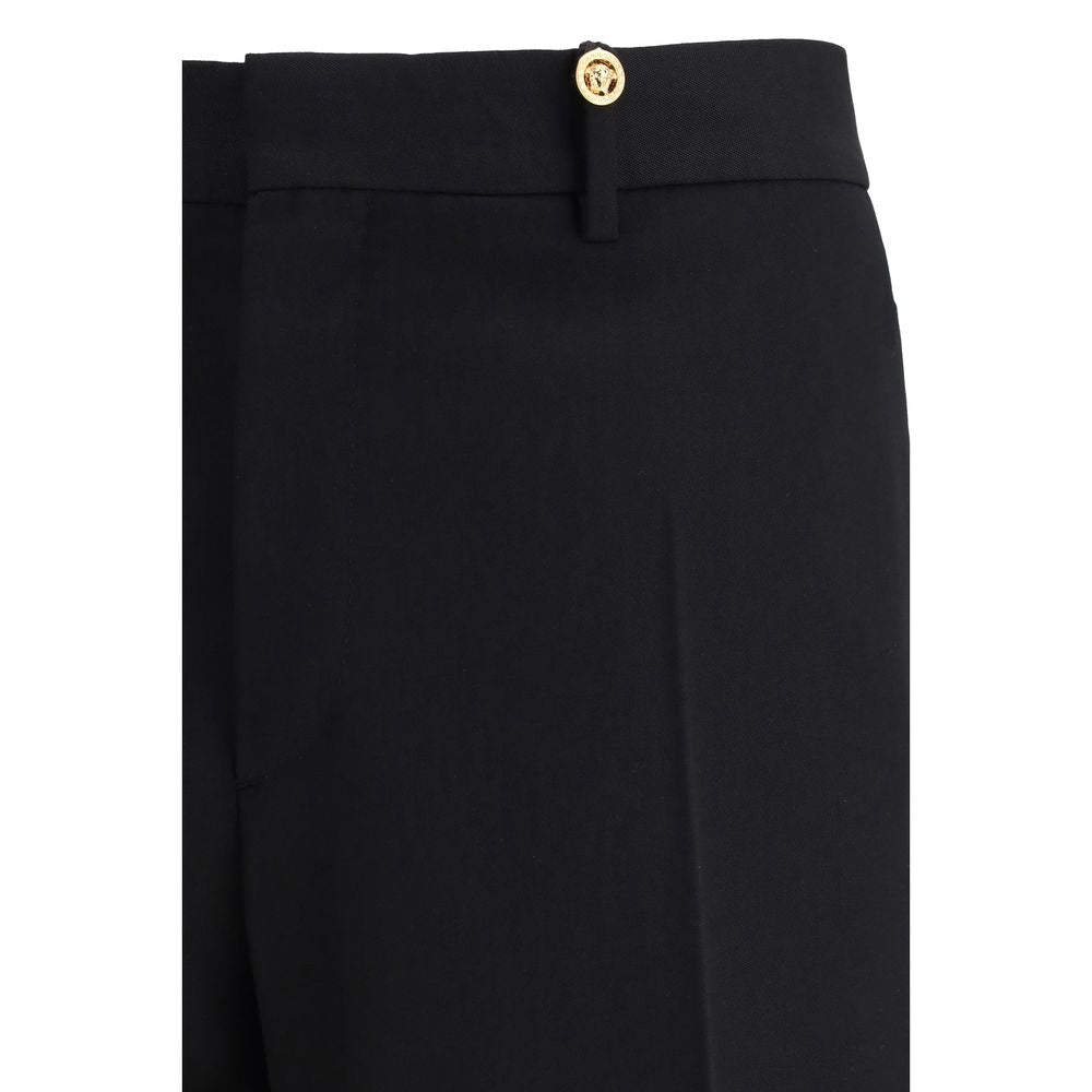 Versace Black Fleece Wool Dress Pants with slim fit and jacquard label detail, featuring concealed hook-and-zip closure.