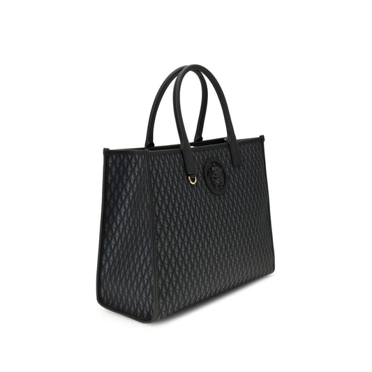 Versace La Medusa Tote Bag in black with allover V pattern and Medusa embellishment, featuring double handles and leather protection feet.