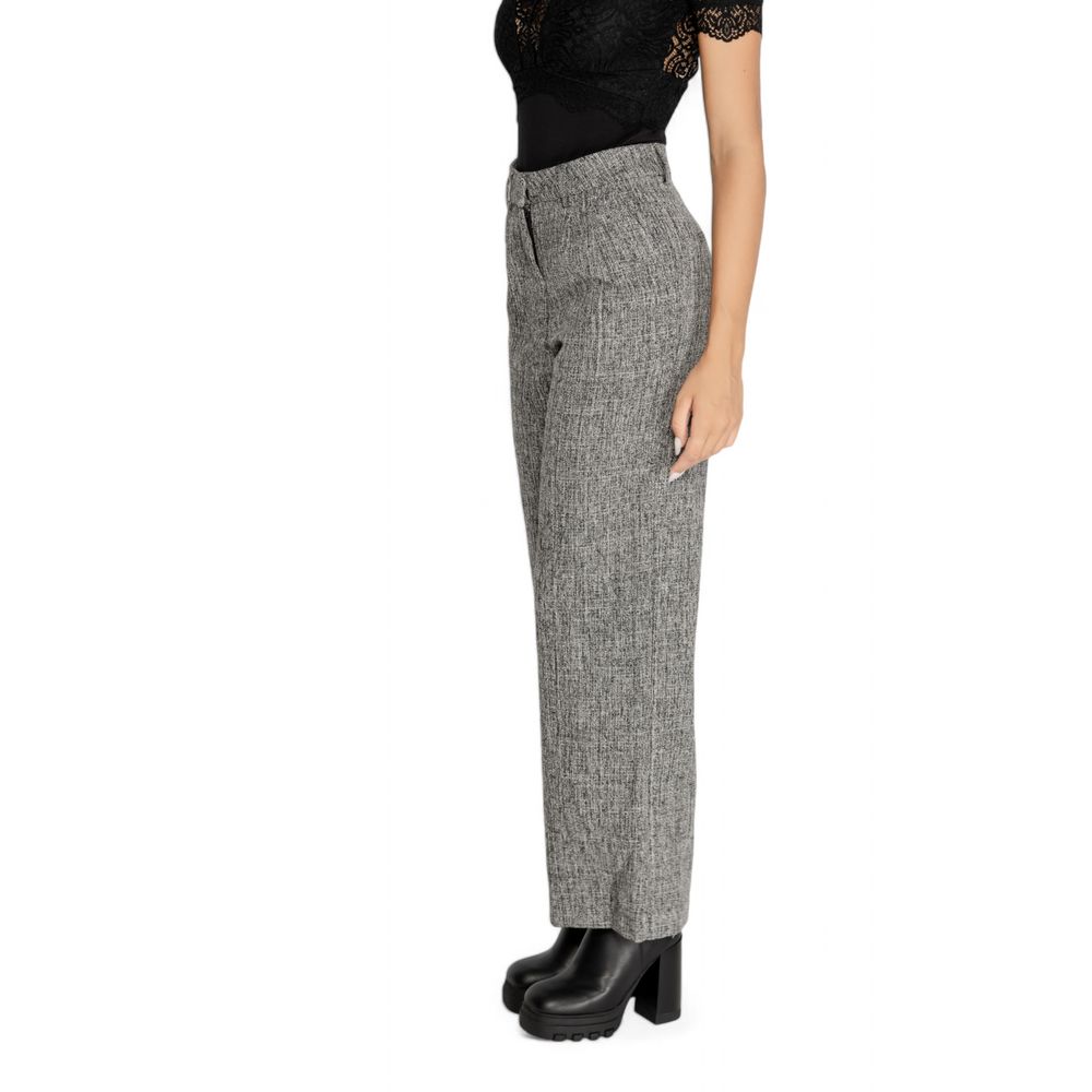 Side view of Vila Clothes Black Recycled Polyester Pant with high waist and wide leg design, enhancing a contemporary silhouette.