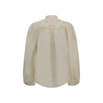 Back view of Zimmermann Embroidered Coco Blouse with puff sleeves, high neck, and lace inserts on lightweight natural ramie fabric.