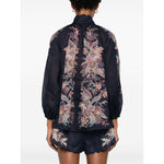Back view of Zimmermann Rhiannon Billow blouse in navy blue with paisley print, featuring long sleeves and elasticated cuffs.